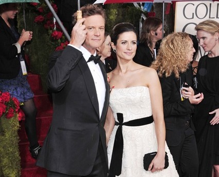 Livia Firth with husband Colin wearing her 'upcycled' wedding dress to the 2010 Golden Globe Awards Ceremony.