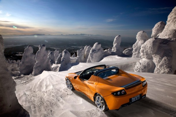 Tesla Roadster in Very Orange, the world's first zero-emissions luxury racing car.