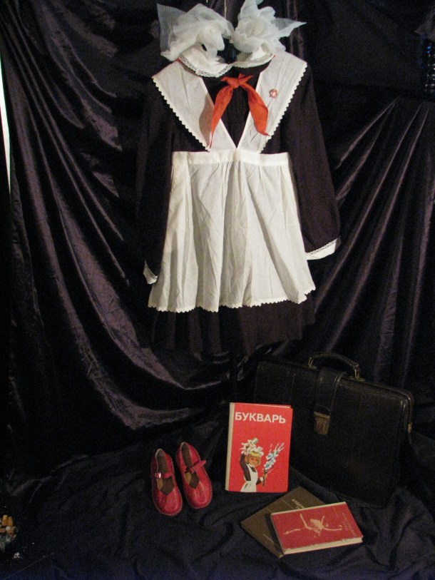 Classic Soviet school uniform for girls. Photo via Frank Vjecy's Soviet Life Collection.