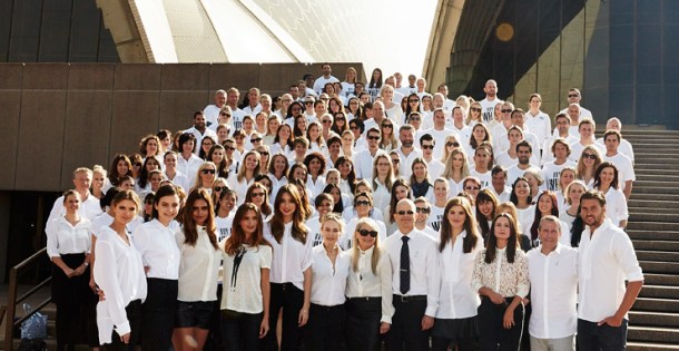 People wearing white shirts pose on the steps of the Sydney Opera House in support of ovarian cancer research. Photo: OCRF.