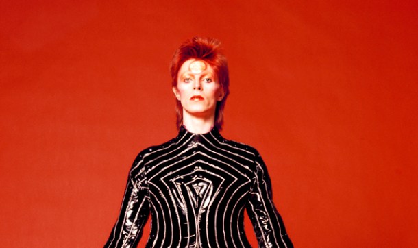 Bowie wearing a striped bodysuit for his 1973 Aladdin Sane Tour designed by Kansai Yamamoto Photo by Masayoshi Sukita.