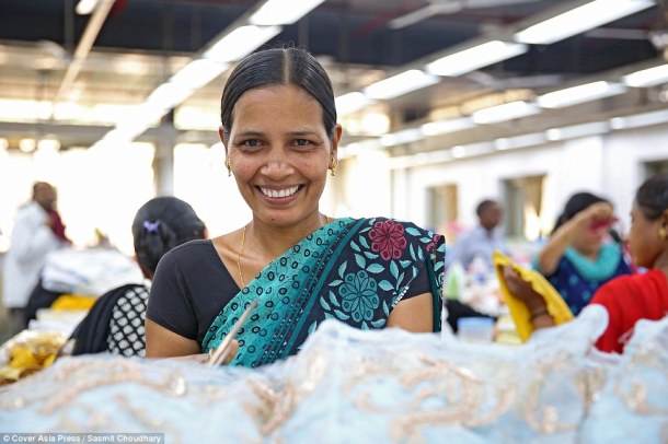 Happy: Babita (pictured) said she doesn't feel envious of famous people wearing the dresses she makes but can’t afford. 'I love my work so I am happy that people on the other side of the world enjoy what we make,’ she told MailOnline Photo via MailOnline